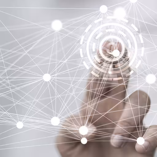 Eine symbolische Darstellung eines Netzwerkes mit einer Hand